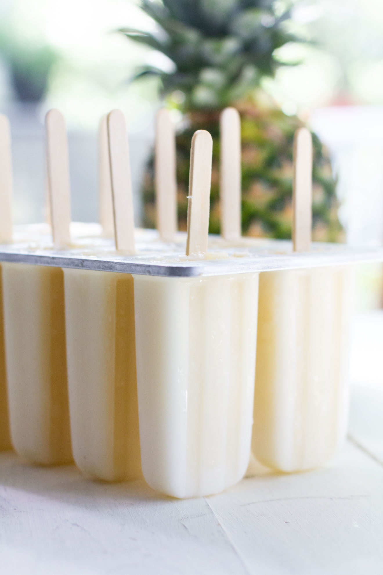 pina colada popsicles in the mold